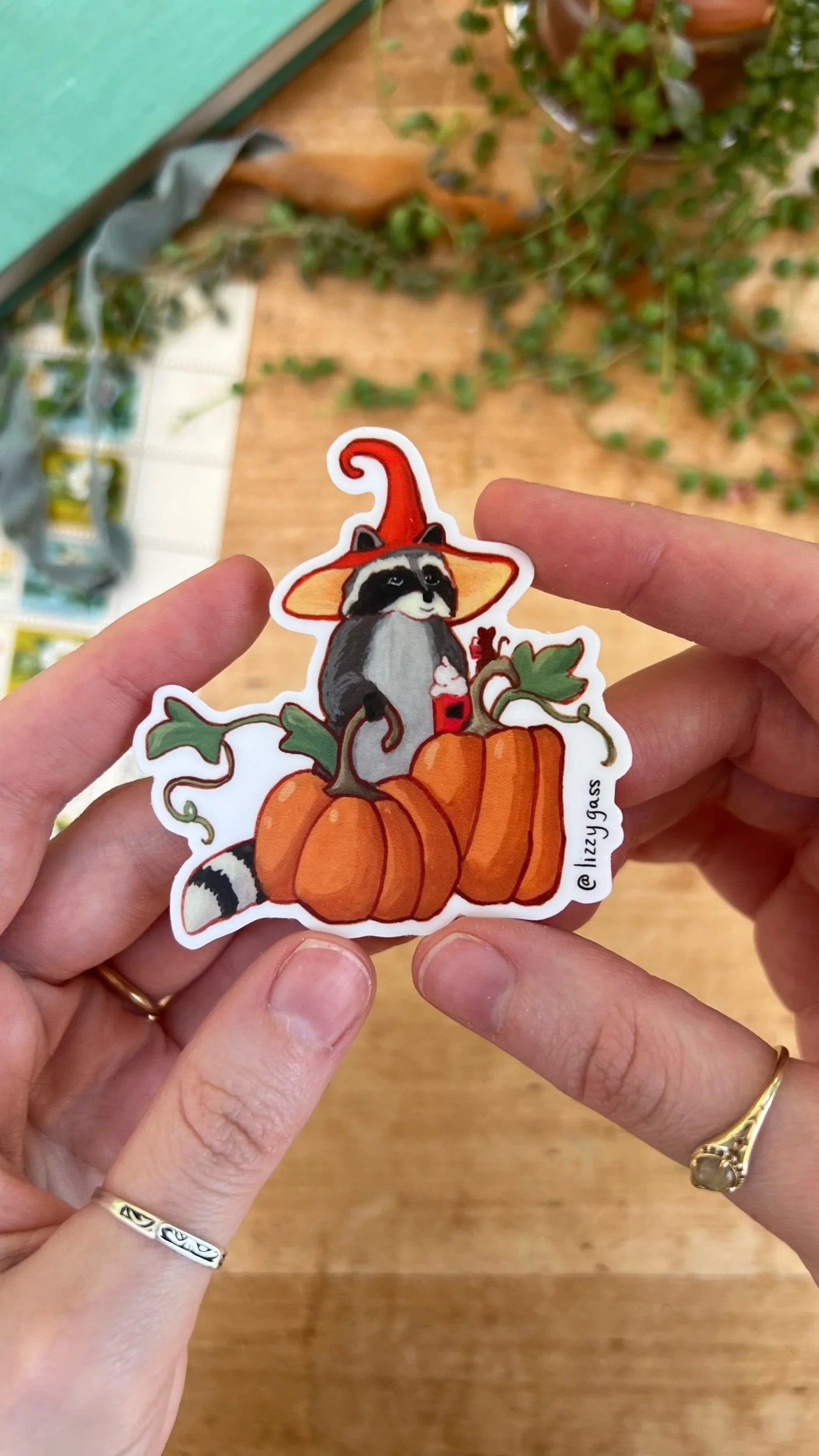 Raccoon and Pumpkins Sticker
