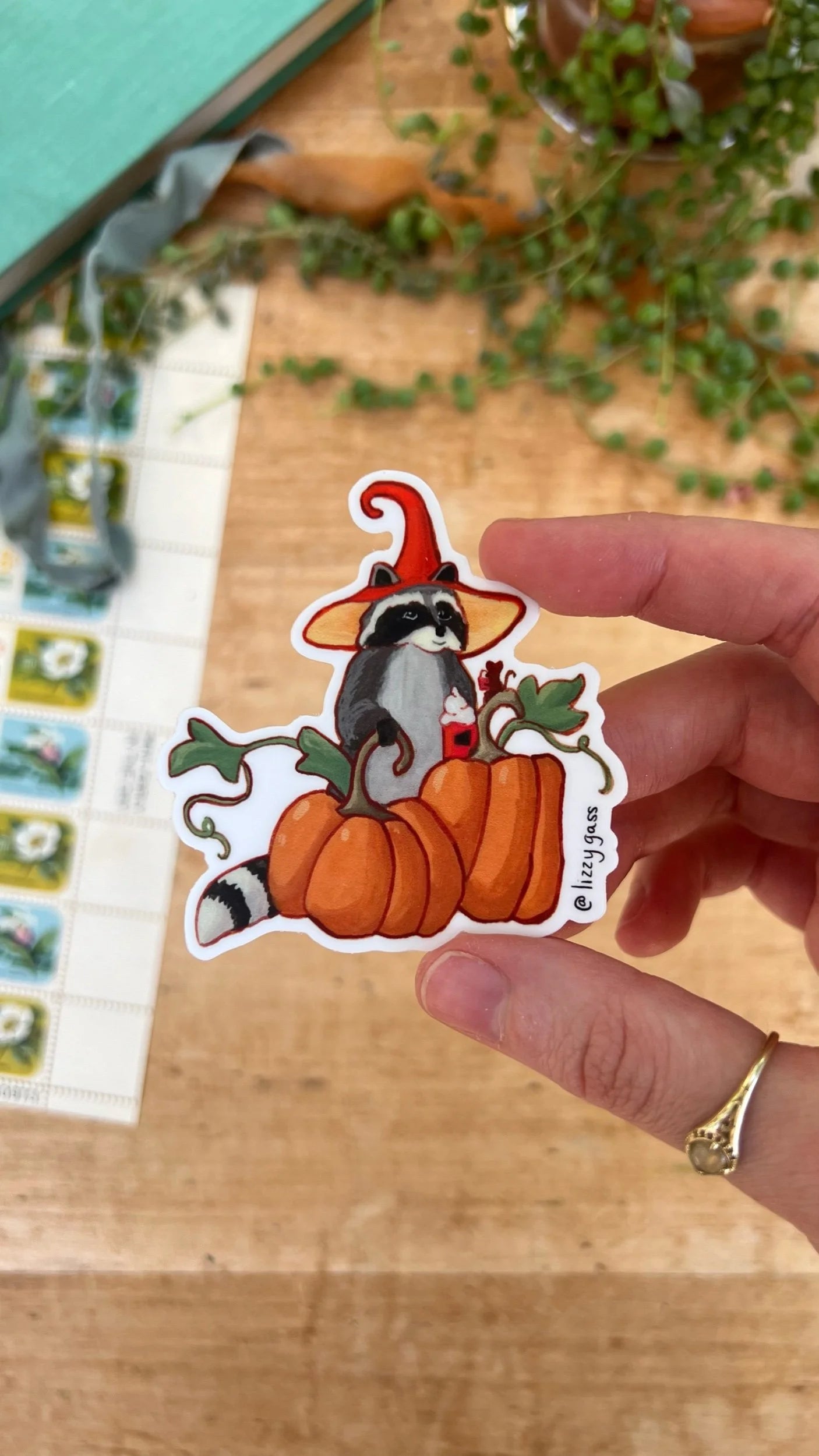 Raccoon and Pumpkins Sticker