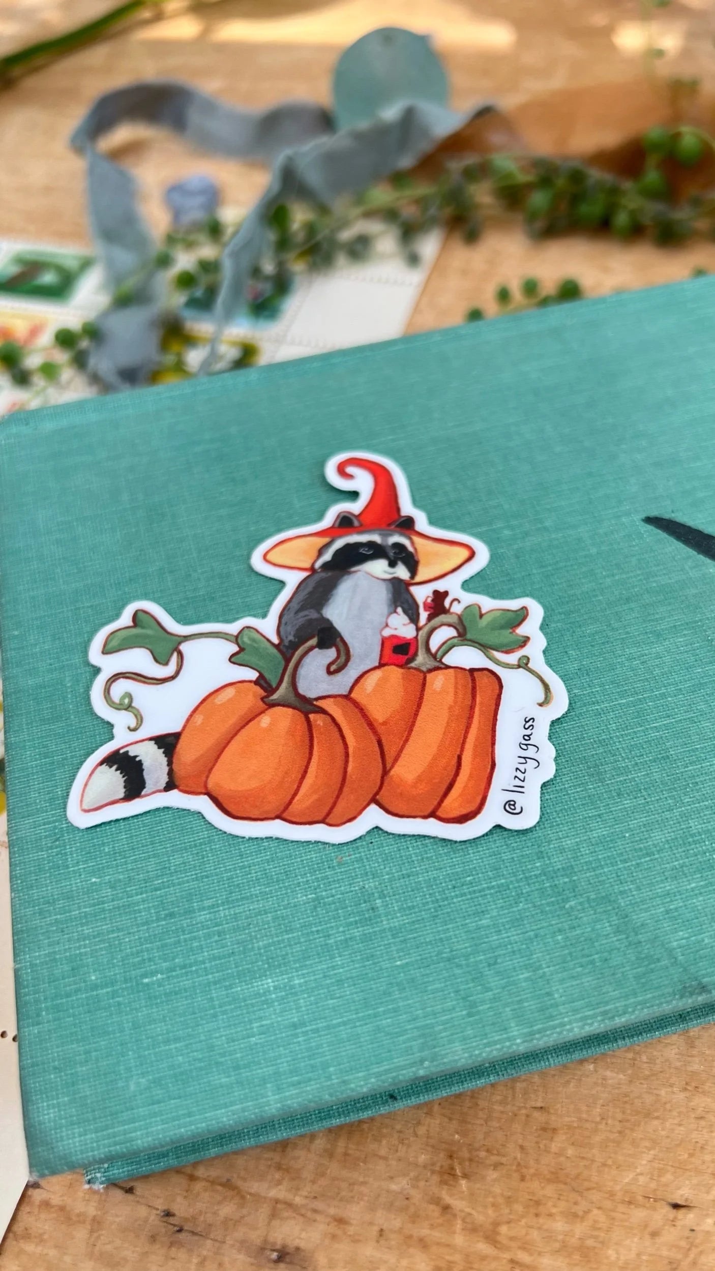 Raccoon and Pumpkins Sticker